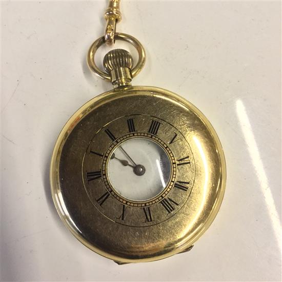 A gold plated half hunter pocket watch on chain